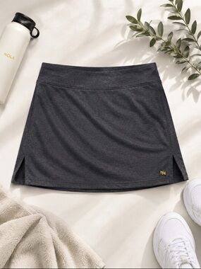 Nola Gray Performance Skort with Yellow Logo Tag